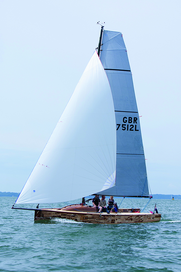 A yacht flying a Code o sail