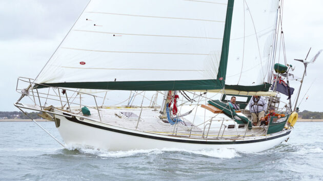 A yacht sailing off the coast