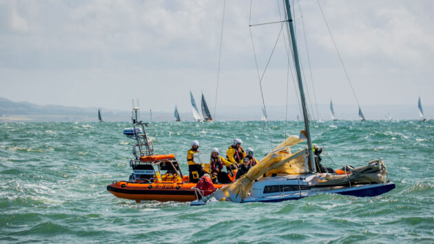 RNLI crew attending a stricken yacht. Credit: RNLI