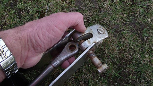 A man removing the drum of a yacht furler