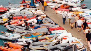 Inflatable dinghies tied to a dock