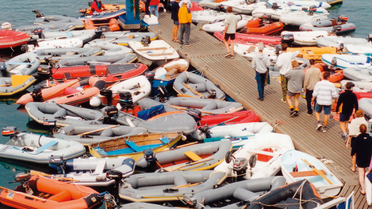 Inflatable dinghies tied to a dock