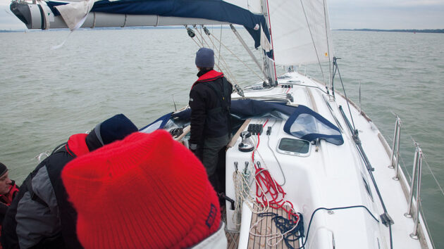 A boat being hove-to to recover a man overboard