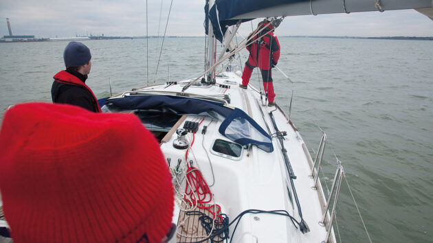 A crew practising man overboard drills