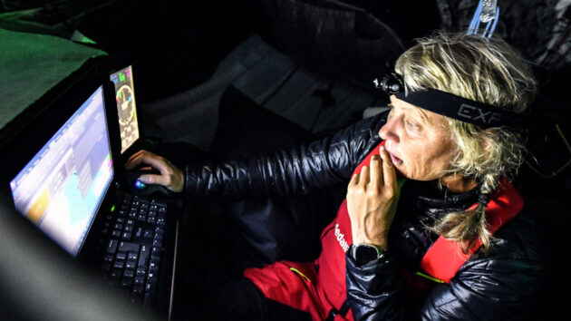 A sailor looking at a computer screen