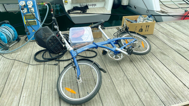 A folding bike lying on its side