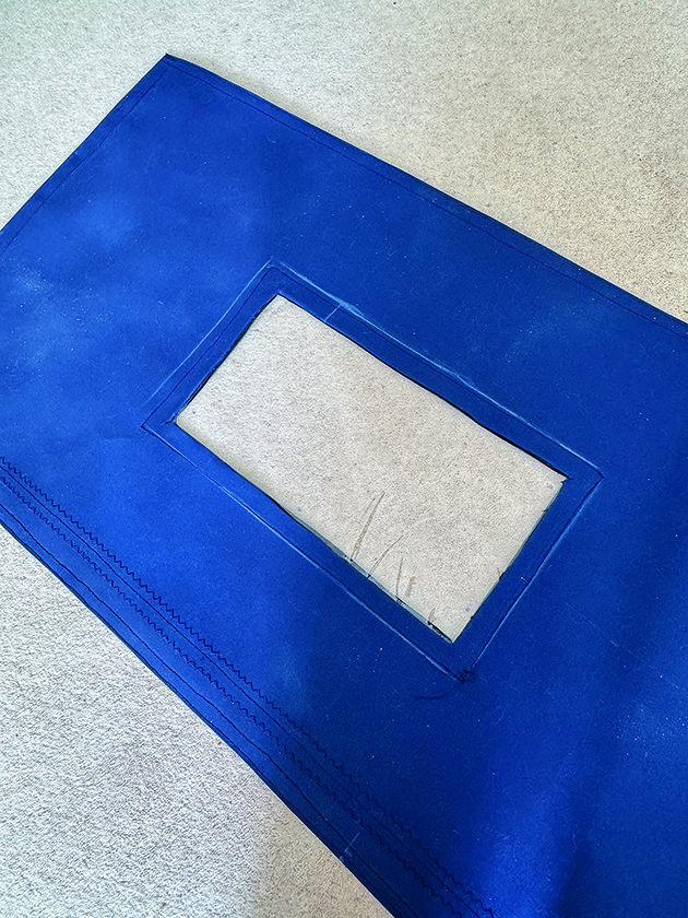 A window in a canvas companionway cover for a boat