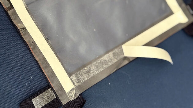 BAsting tape being fitted to canvas