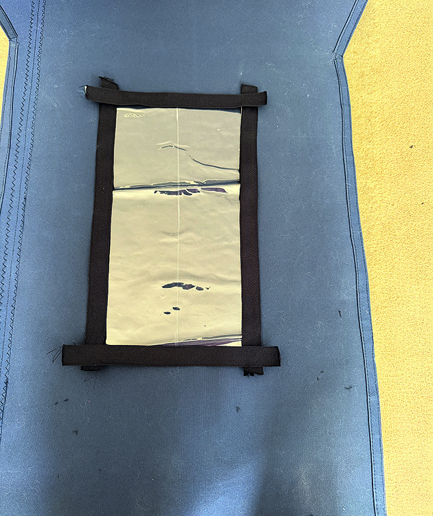 A window being stuck on a piece of canvas