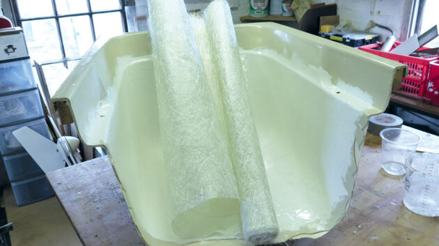 Chopped strand mat for laying up a mould of a doghouse from an old bath