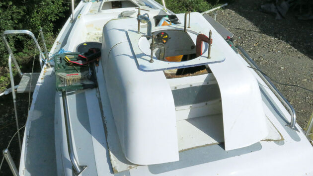 Part of a doghouse being installed on a boat
