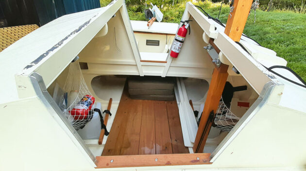 The inside of a small trailer-sailer boat