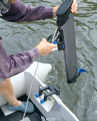 A man testing the ePropulsion eLite electric outboard