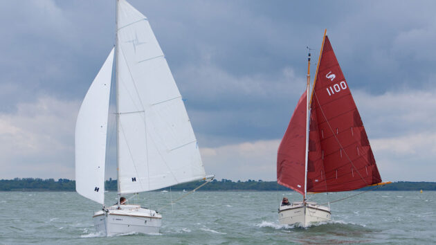 two boat sailing side by side