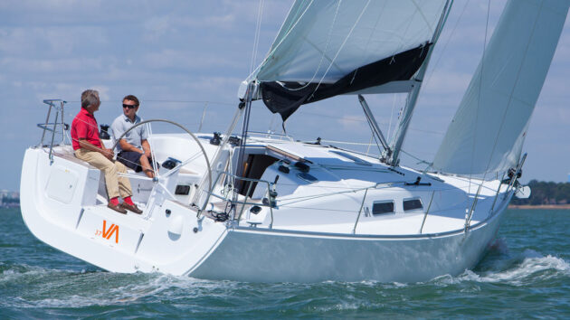 Two men sailing a yacht