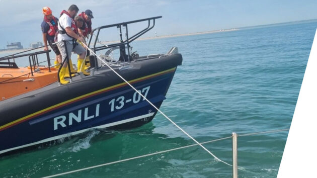 The RNLI helping to rescue a boat after lobster pots entanglement