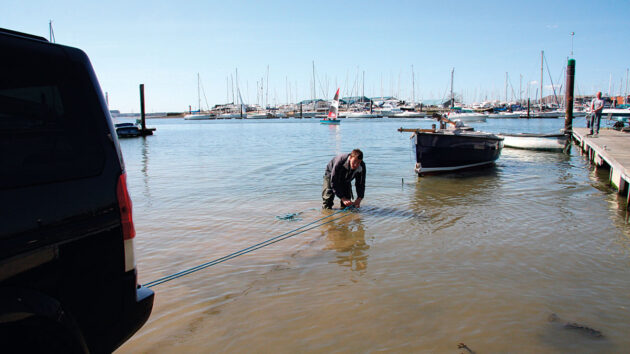 A man tying a rope