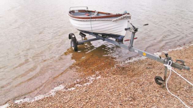A small dinghy by the shoreline