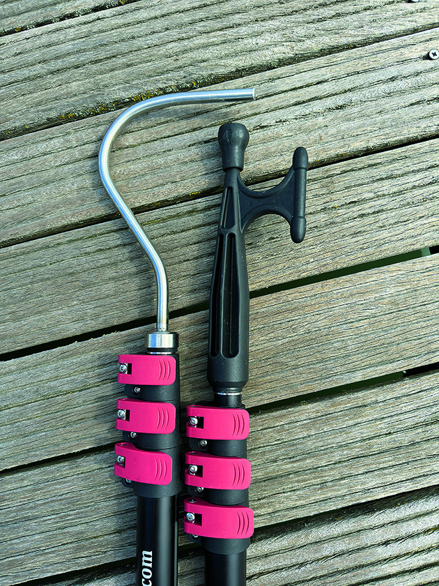 A Buoycatcher Boat Crook next to a conventional boat hook
