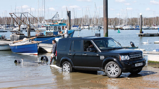 A man launching a boat