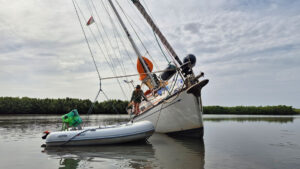 A yacht aground in a river