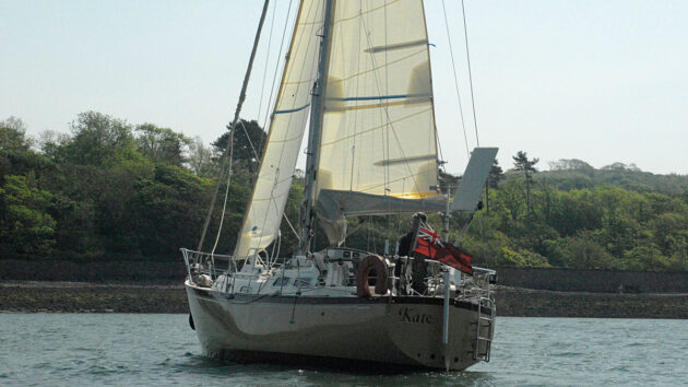 A cutter rig yacht heaving to