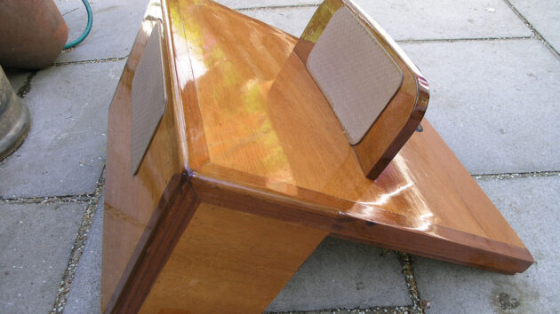 A newly varnished engine cover for a boat