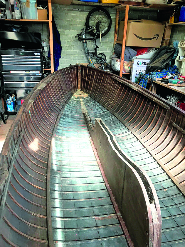 A wooden dinghy under restoration