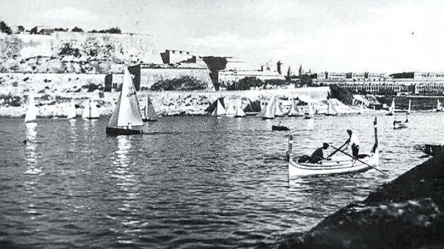 A black and white image of yacht racing