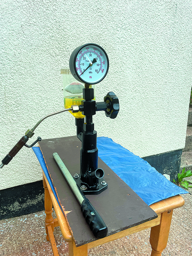Pressure testing injectors for a Fuel system clean