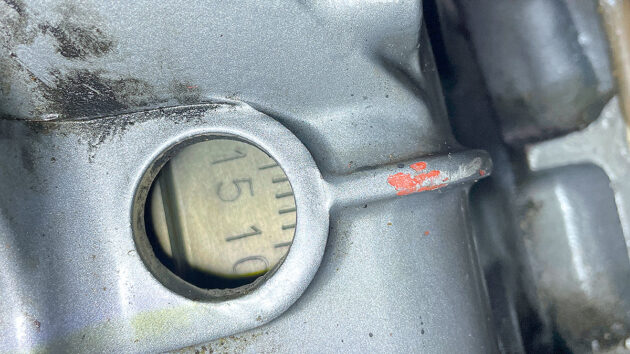Timing window in a flywheel on an engine as part of a fuel system clean