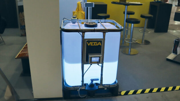 A boat holding tank with a light shining behind it