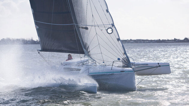 A person sailing a trimaran