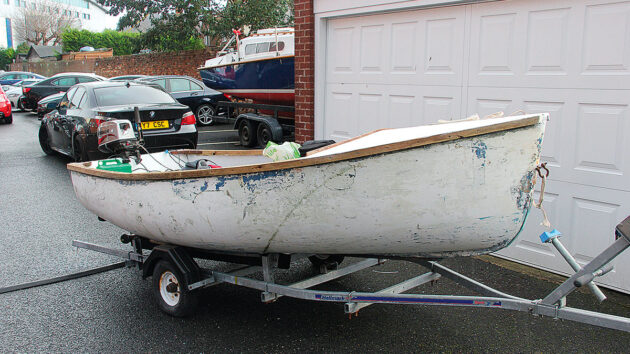 a sailing dinghy on a trailer