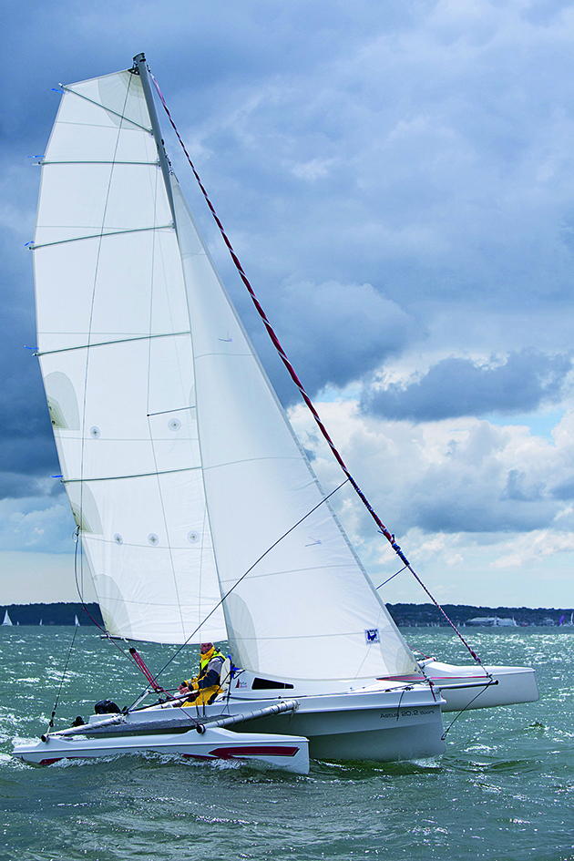 Two people sailing an Astus 20.2