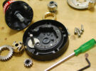 Parts of a winch laid out while servicing