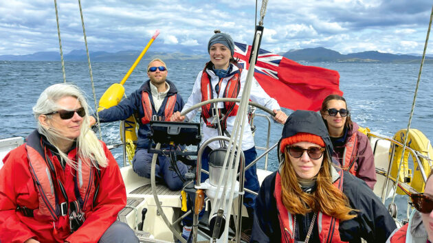 Crew smiling during UK boating holidays