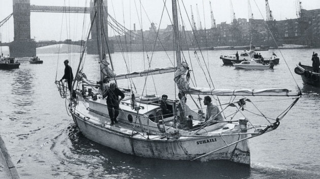 A yacht sailing up the Thames