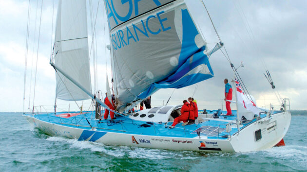 A yacht sailing with crew