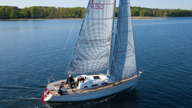 A Faurby 335E yacht sailing off the coast