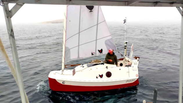 Yann Quenet aboard his 4m boat