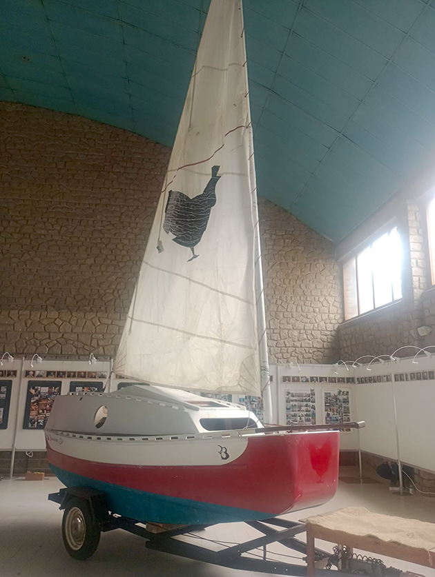 The 4m boat belonging to Yann Quenet on a trailer in a shed