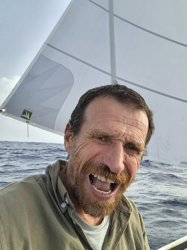 Yann Quenet on his 4m boat