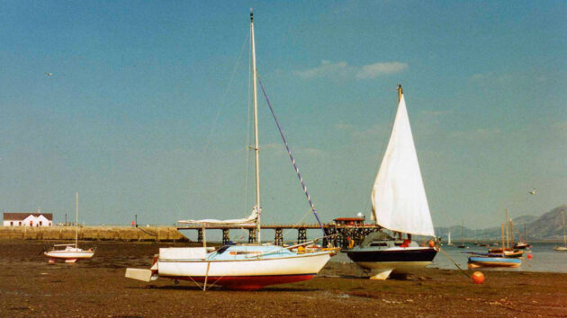 a boat dried out on the shore