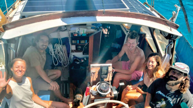 Dinner with the crew aboard Acid Rain yacht. Credit: Alex Carter