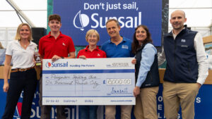 Paignton Sailing Club representatives claim their top prize in Sunsail's Funding the Future initiative 2026 with judges from Sunsail, the RYA, YachtsandYachting.com and PBO's Katy Stickland (second left)