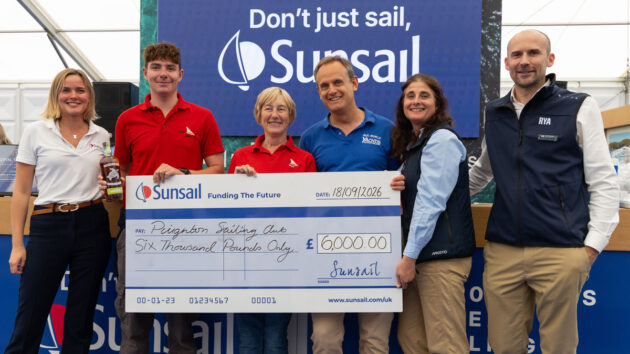 Paignton Sailing Club representatives claim their top prize in Sunsail's Funding the Future initiative 2026 with judges from Sunsail, the RYA, YachtsandYachting.com and PBO's Katy Stickland (second left)
