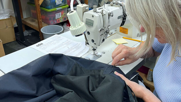 Professional repair of technical clothing. Credit: Gill/gb.gillmarine.com