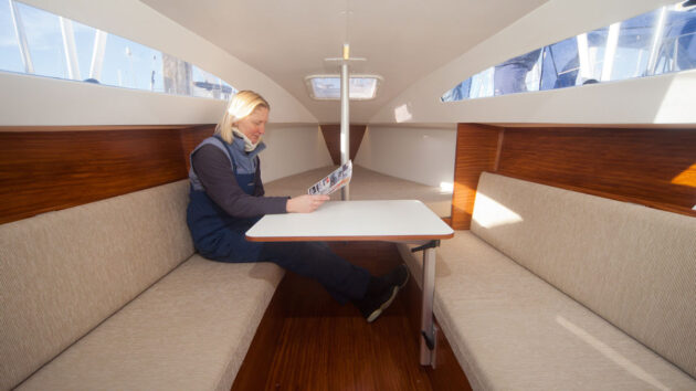A woman sitting on a seat in a boat