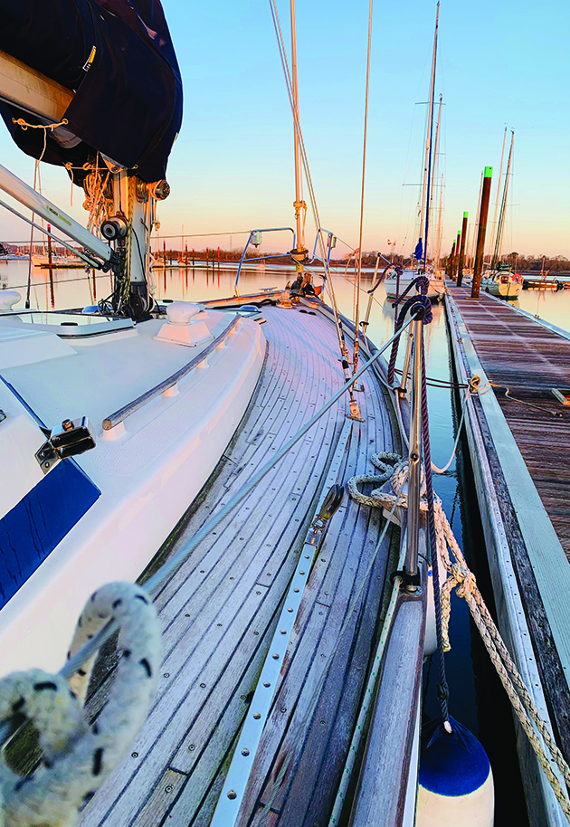Icy decks on a liveboard boaty moored by a marina